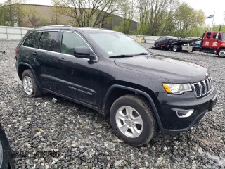 2017 Jeep Grand Cherokee Laredo with VIN 1C4RJFAG2HC754157, listed as a Copart auction lot 55650095 with 60,767 mi miles and Salvage title. Bid and sale history available at DreamBid. Image 4.
