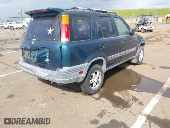 1997 Honda CR-V with VIN JHLRD1850VC057518, listed as a IAAI auction lot 41948236 with 251,707 mi miles. Bid and sale history available at carsss.com. Image 4.