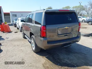 2016 Chevrolet Tahoe LT with VIN 1GNSKBKC9GR434579, listed as a IAAI auction lot 42080094 with 137,910 mi miles and . Bid and sale history available at DreamBid. Image 3.