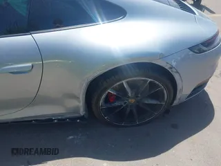2020 Porsche 911 Carrera S z VIN WP0AB2A90LS229570, wystawiony jako IAAI lot #42242278 z przebiegiem 15 967 mil mil oraz . Historia ofert i sprzedaży dostępna na DreamBid. Obrazek 18.