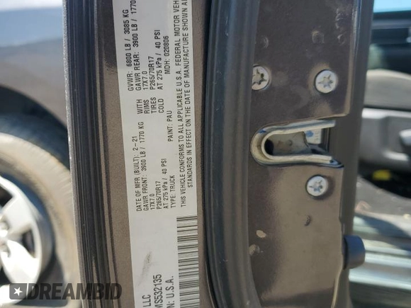 2021 Ram 1500 SLT with VIN 1C6RR7LG7MS532135, listed as a Copart auction lot 56285155 with 105,848 mi miles and Salvage title. Bid and sale history available at DreamBid. Image 12.