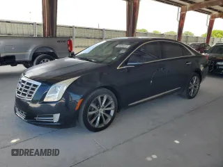 2013 Cadillac XTS Luxury z VIN 2G61P5S35D9220365, wystawiony jako Copart lot #58405515 z przebiegiem 98 701 mil mil oraz Szkody całkowita. Historia ofert i sprzedaży dostępna na DreamBid. Obrazek 1.