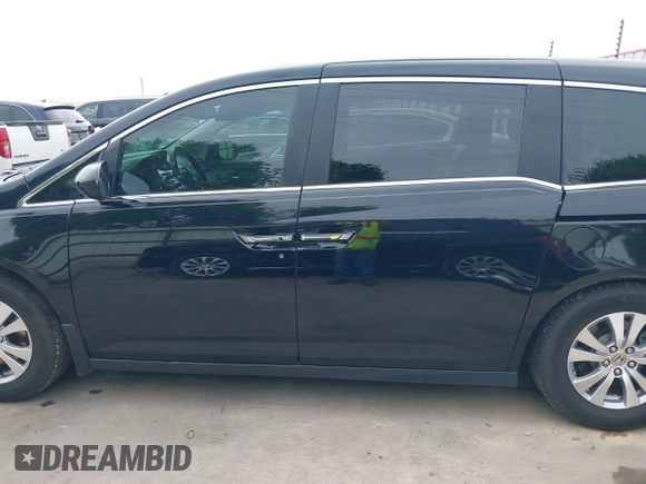 2015 Honda Odyssey EX-L with VIN 5FNRL5H6XFB091289, listed as a IAAI auction lot 41904542 with 152,182 mi miles and . Bid and sale history available at DreamBid. Image 15.
