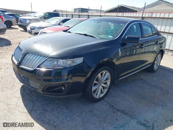 2009 Lincoln MKS with VIN 1LNHM93R79G629647, listed as a IAAI auction lot 41688052 with 180901 miles. Bid and sale history available at carsss.com. Image 2.
