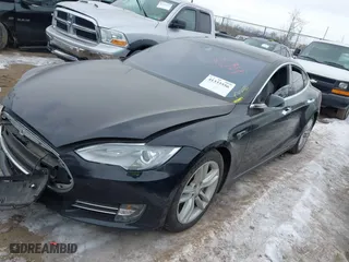 2015 Tesla Model S 85D with VIN 5YJSA1E25FF107819, listed as a IAAI auction lot 41333556 with 141,066 mi miles. Bid and sale history available at carsss.com. Image 2.