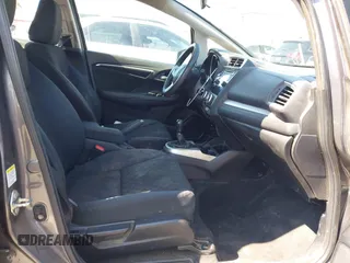 2015 Honda Fit LX with VIN 3HGGK5G54FM731965, listed as a IAAI auction lot 42655355 with 141,205 mi miles and . Bid and sale history available at DreamBid. Image 5.