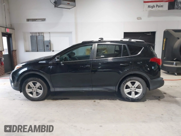 2013 Toyota RAV4 XLE with VIN 2T3WFREV0DW043014, listed as a IAAI auction lot 42357148 with 189,090 mi miles and . Bid and sale history available at DreamBid. Image 14.