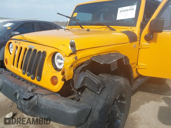2012 Jeep Wrangler Sport with VIN 1C4AJWAG0CL128595, listed as a IAAI auction lot 42048590 with 133,085 mi miles and . Bid and sale history available at DreamBid. Image 6.