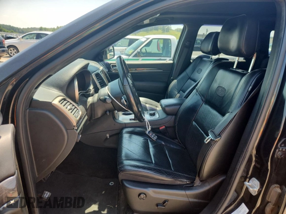 2015 Jeep Grand Cherokee High Altitude with VIN 1C4RJFCMXFC618536, listed as a Copart auction lot 64569685 with 110,982 mi miles and Clean title. Bid and sale history available at DreamBid. Image 7.