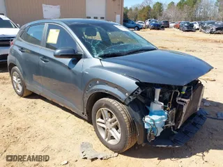 2021 Hyundai Kona SE with VIN KM8K12AA1MU705988, listed as a IAAI auction lot 41665055 with 52,719 mi miles. Bid and sale history available at carsss.com. Image 1.