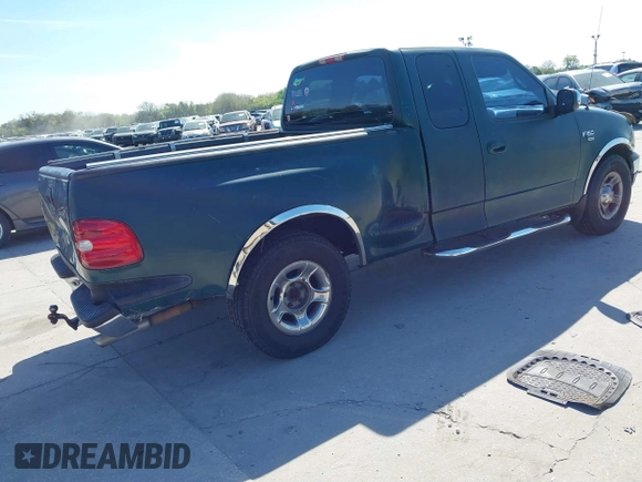 1999 Ford F-150 XL with VIN 2FTRX07W1XCA67223, listed as a IAAI auction lot 41661743 with 1 mi miles. Bid and sale history available at carsss.com. Image 4.
