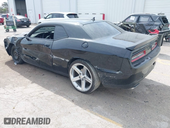 2016 Dodge Challenger R/T Plus with VIN 2C3CDZBT7GH177992, listed as a IAAI auction lot 42136475 with 132,808 mi miles and . Bid and sale history available at DreamBid. Image 3.