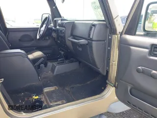 2004 Jeep Wrangler Sport with VIN 1J4FA49SX4P774167, listed as a IAAI auction lot 42686834 with 170,731 mi miles and . Bid and sale history available at DreamBid. Image 5.