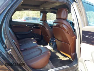 2011 Audi A8 with VIN WAURVAFDXBN014290, listed as a IAAI auction lot 40860777 with 152,584 mi miles and . Bid and sale history available at DreamBid. Image 8.