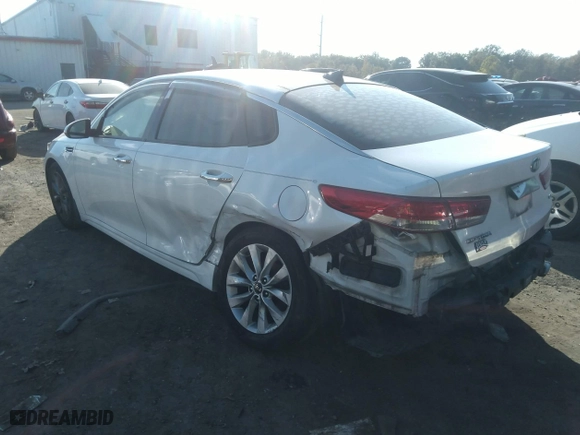 2017 Kia Optima EX with VIN 5XXGU4L32HG156941, listed as a IAAI auction lot 40299001 with 128,592 mi miles. Bid and sale history available at carsss.com. Image 3.