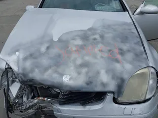 1998 Mercedes-Benz SLK 230/320 z VIN WDBKK47F0WF020242, wystawiony jako IAAI lot #41913424 z przebiegiem Nie podano mil oraz . Historia ofert i sprzedaży dostępna na DreamBid. Obrazek 10.