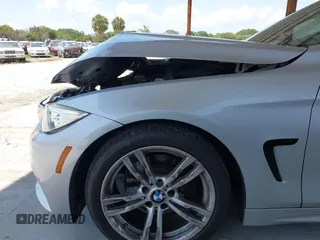 2015 BMW 4 Series 428i with VIN WBA4A5C58FD410076, listed as a IAAI auction lot 39384271 with 125,987 mi miles and . Bid and sale history available at DreamBid. Image 15.