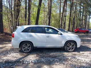 2014 Kia Sorento SX with VIN 5XYKW4A72EG492736, listed as a IAAI auction lot 42009349 with 165,492 mi miles. Bid and sale history available at carsss.com. Image 13.