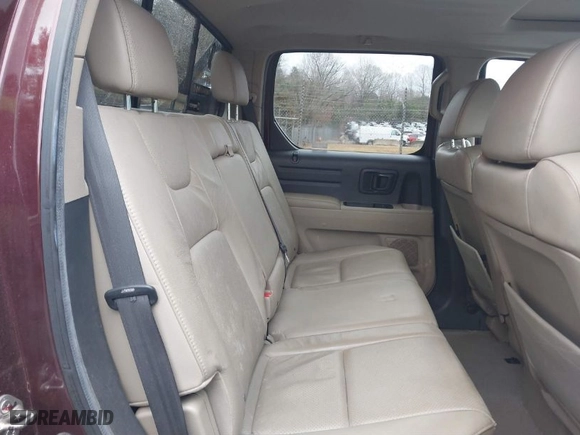 2009 Honda Ridgeline RTL with VIN 5FPYK16559B103698, listed as a IAAI auction lot 41479390 with 144,554 mi miles. Bid and sale history available at carsss.com. Image 8.