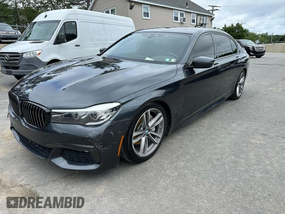 2019 BMW 7 Series 740i xDrive with VIN WBA7E4C55KGV28722, listed as a Copart auction lot 64955445 with 94,901 mi miles and Clean title. Bid and sale history available at DreamBid. Image 1.