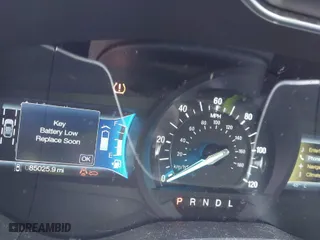 2014 Ford Fusion Energi Titanium with VIN 3FA6P0SUXER216960, listed as a IAAI auction lot 41339413 with 85,025 mi miles. Bid and sale history available at carsss.com. Image 7.