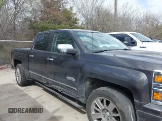 2014 Chevrolet Silverado 1500 High Country with VIN 3GCUKTEC8EG399193, listed as a IAAI auction lot 41789709 with 207,890 mi miles. Bid and sale history available at carsss.com. Image 13.