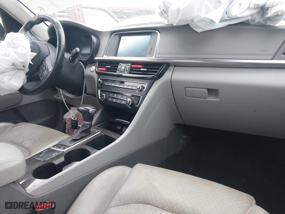 2016 Kia Optima EX with VIN 5XXGU4L30GG120518, listed as a IAAI auction lot 41602190 with 116,268 mi miles. Bid and sale history available at carsss.com. Image 5.