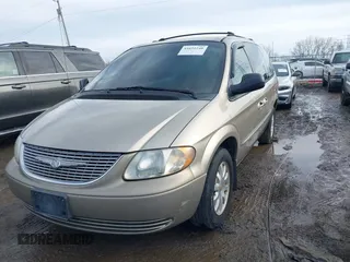 2002 Chrysler Town & Country EX with VIN 2C8GP74L62R524896, listed as a IAAI auction lot 41651240 with 128,983 mi miles and . Bid and sale history available at carsss.com. Image 2.