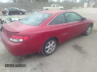 1999 Toyota Solara SE with VIN 2T1CF28P5XC209470, listed as a IAAI auction lot 40946856 with 246,277 mi miles. Bid and sale history available at carsss.com. Image 4.