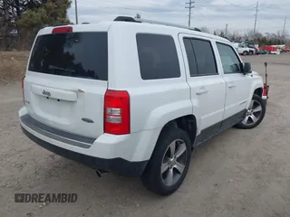 2016 Jeep Patriot Latitude with VIN 1C4NJRFBXGD627551, listed as a IAAI auction lot 41716065 with 140,000 mi miles. Bid and sale history available at carsss.com. Image 4.