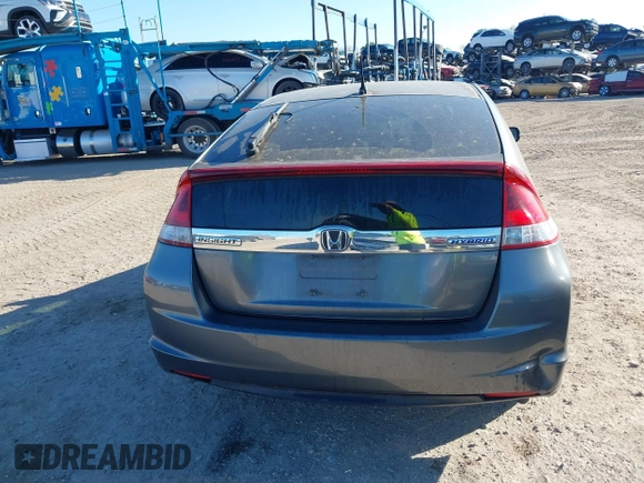 2012 Honda Insight LX with VIN JHMZE2H51CS003694, listed as a IAAI auction lot 41781384 with 154,685 mi miles and . Bid and sale history available at DreamBid. Image 16.
