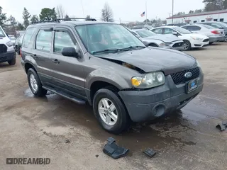2005 Ford Escape XLS Value with VIN 1FMYU92Z35KA20497, listed as a IAAI auction lot 41509893 with 149,866 mi miles. Bid and sale history available at carsss.com. Image 1.