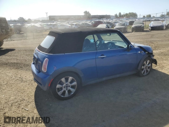 2005 MINI Convertible S z VIN WMWRH33565TK56154, wystawiony jako Copart lot #55860025 z przebiegiem 59 672 mil mil oraz Szkoda całkowita • Salvage title. Historia ofert i sprzedaży dostępna na DreamBid. Obrazek 3.