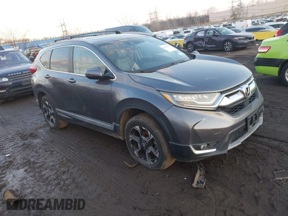 2017 Honda CR-V Touring with VIN 2HKRW2H94HH617081, listed as a IAAI auction lot 41294254 with 145,140 mi miles. Bid and sale history available at carsss.com. Image 1.