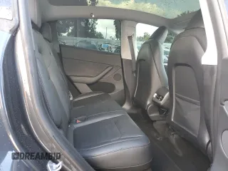 2024 Tesla Model Y Long Range z VIN 7SAYGDEE4RA229466, wystawiony jako Copart lot #45163325 z przebiegiem 13 748 mil mil oraz Szkoda całkowita • Salvage title. Historia ofert i sprzedaży dostępna na DreamBid. Obrazek 11.