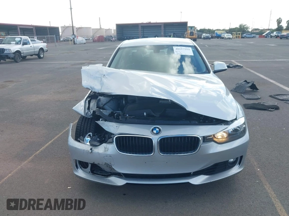 2012 BMW 3 Series 328i with VIN WBA3A5G52CNN65587, listed as a IAAI auction lot 40257554 with 89,445 mi miles and . Bid and sale history available at DreamBid. Image 13.