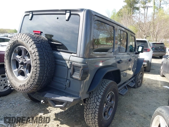 2019 Jeep Wrangler Unlimited Sport Altitude with VIN 1C4HJXDG3KW639148, listed as a IAAI auction lot 41933844 with 57,184 mi miles and . Bid and sale history available at DreamBid. Image 4.