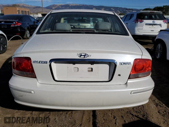 2004 Hyundai Sonata GLS with VIN KMHWF35HX4A975027, listed as a Copart auction lot 82652354 with 148,296 mi miles and Salvage Title. Bid and sale history available at carsss.com. Image 6.