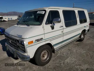 1994 Chevrolet Chevy Van z VIN 1GBEG25K9RF182710, wystawiony jako Copart lot #79284544 z przebiegiem 178 640 mil mil oraz Tytuł czysty. Historia ofert i sprzedaży dostępna na DreamBid. Obrazek 1.