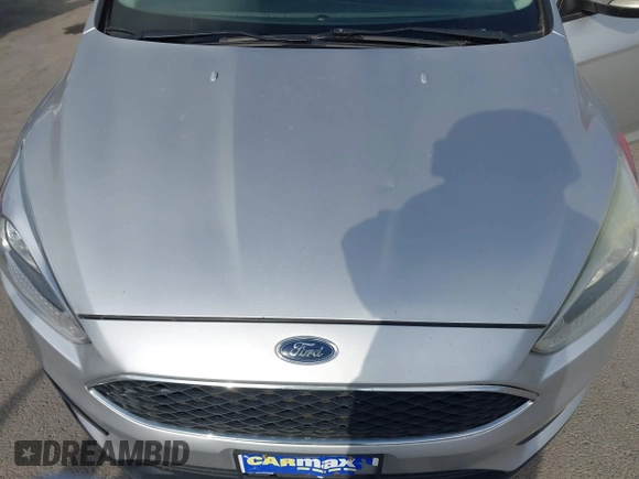 2015 Ford Focus SE with VIN 1FADP3F2XFL340583, listed as a IAAI auction lot 42099224 with 111,970 mi miles. Bid and sale history available at carsss.com. Image 6.
