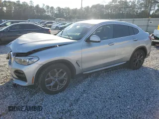 2021 BMW X4 xDrive30i with VIN 5UX2V1C04M9G96019, listed as a Copart auction lot 87287934 with Not provided miles and Salvage title. Bid and sale history available at DreamBid. Image 1.