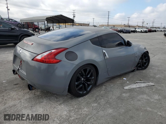 2017 Nissan 370Z с VIN JN1AZ4EH8HM950212, выставлен на аукционе Copart как лот 86412744 с пробегом 34 321 миль миль и Списание • Salvage title. История ставок и продаж доступна на DreamBid. Изображение 3.