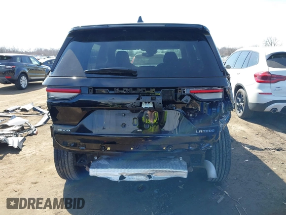 2023 Jeep Grand Cherokee Laredo with VIN 1C4RJHAG7PC600196, listed as a IAAI auction lot 41695837 with 19,110 mi miles and . Bid and sale history available at DreamBid. Image 6.