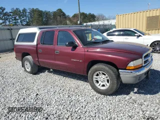 2001 Dodge Dakota Sport с VIN 1B7GL2ANX1S102505, выставлен на аукционе Copart как лот 47586155 с пробегом 242 272 миль миль и Списание • Salvage title. История ставок и продаж доступна на DreamBid. Изображение 4.