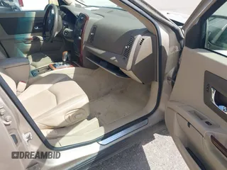 2006 Cadillac SRX z VIN 1GYEE637860206995, wystawiony jako IAAI lot #42338856 z przebiegiem 163 773 mil mil oraz . Historia ofert i sprzedaży dostępna na DreamBid. Obrazek 5.