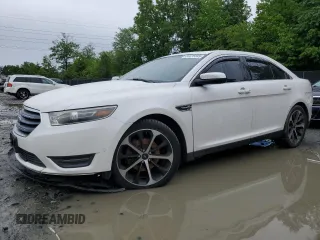 2015 Ford Taurus SEL z VIN 1FAHP2E82FG172545, wystawiony jako Copart lot #58475585 z przebiegiem Nie podano mil oraz Szkoda całkowita • Salvage title. Historia ofert i sprzedaży dostępna na DreamBid. Obrazek 1.