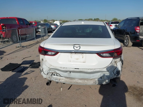 2016 Mazda Mazda6 i Grand Touring with VIN JM1GJ1W54G1456737, listed as a IAAI auction lot 41841001 with 114,870 mi miles. Bid and sale history available at carsss.com. Image 17.