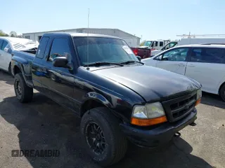 1999 Ford Ranger XL with VIN 1FTZR15V3XPB55652, listed as a IAAI auction lot 41892631 with 238,995 mi miles. Bid and sale history available at carsss.com. Image 1.