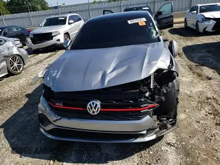 2020 Volkswagen Jetta GLI S z VIN 3VW5T7BUXLM010832, wystawiony jako Copart lot #66376523 z przebiegiem 66 434 mil mil oraz . Historia ofert i sprzedaży dostępna na DreamBid. Obrazek 11.