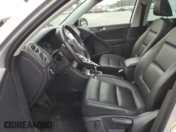 2011 Volkswagen Tiguan SE with VIN WVGBV7AX1BW559924, listed as a Copart auction lot 53914175 with 215,511 mi miles and Clean Title. Bid and sale history available at DreamBid. Image 7.